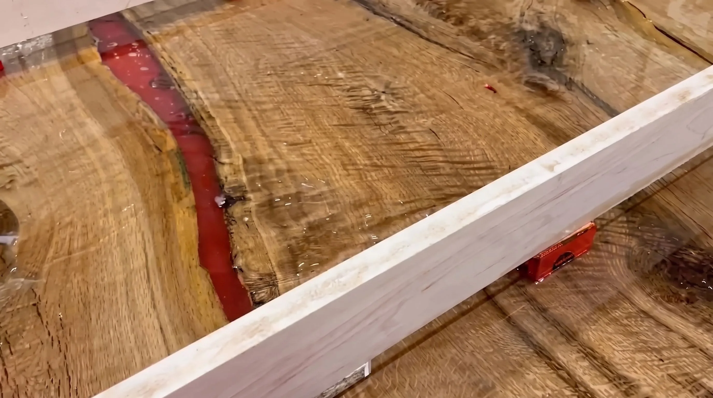 Still from the film “The Will-O epoxy table with a centre leaf”.