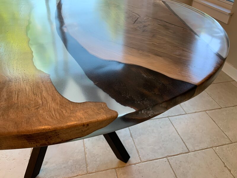 Close up clear epoxy resin table