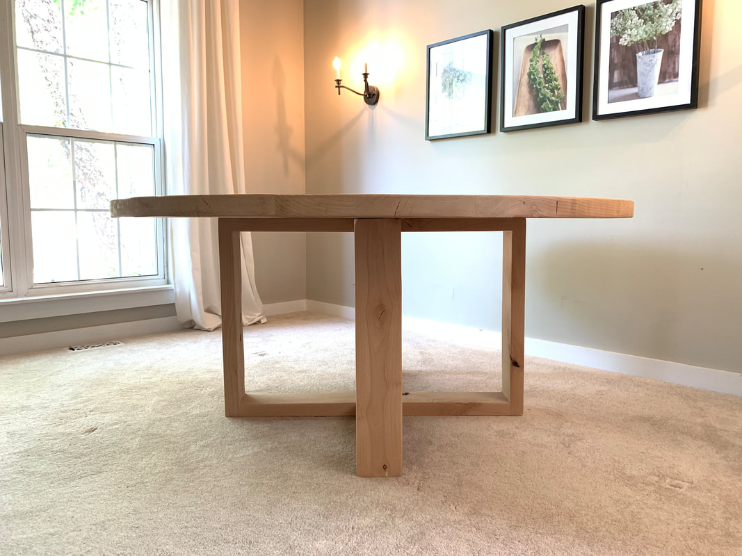 Custom alder table finished with a clear hardwax